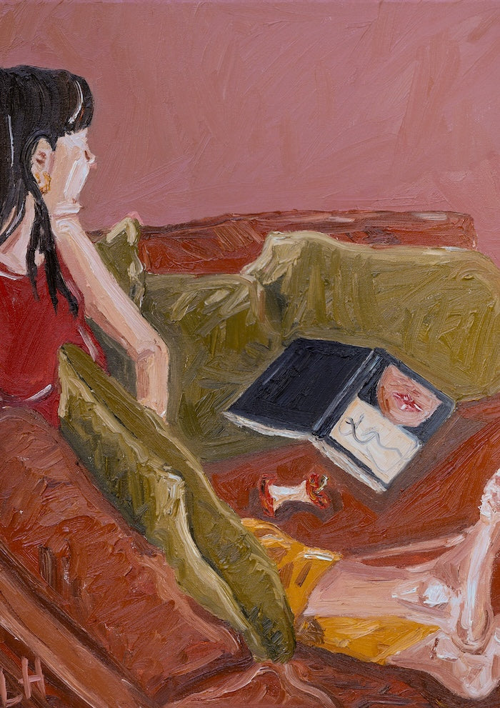 apple, book on the couch