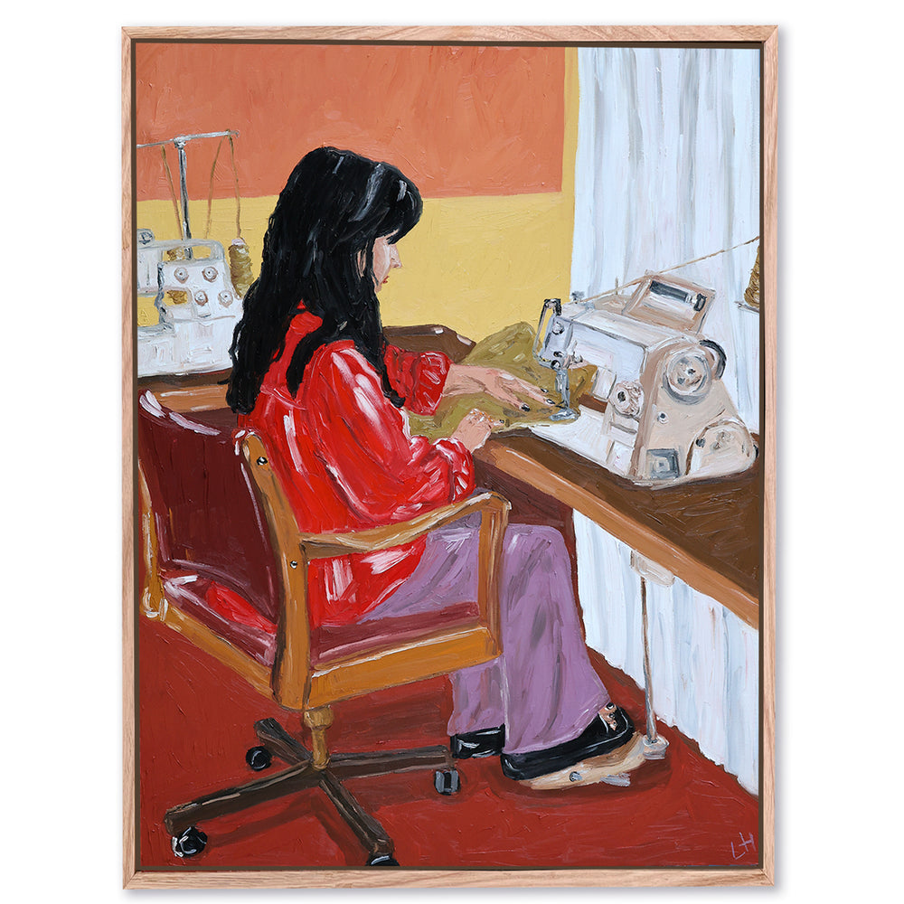 at the sewing machine