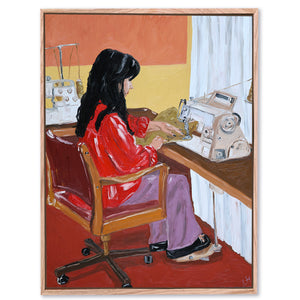 at the sewing machine